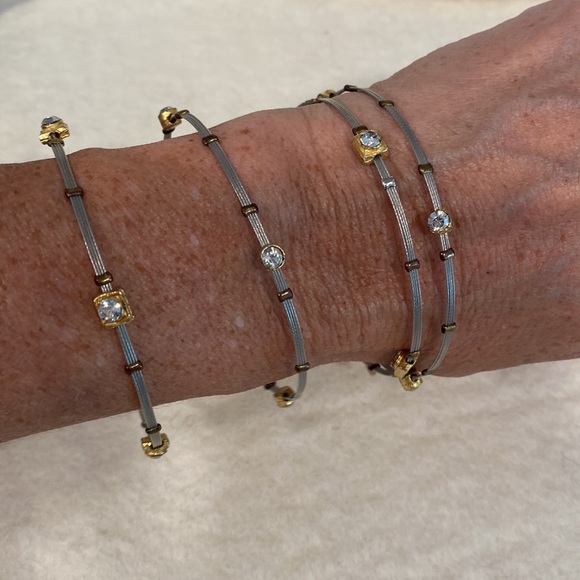 Set of four individual two-tone bracelets with sparkle. - Picture 2 of 7